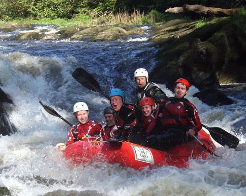 White water Rafting down Henllan falls Wales
